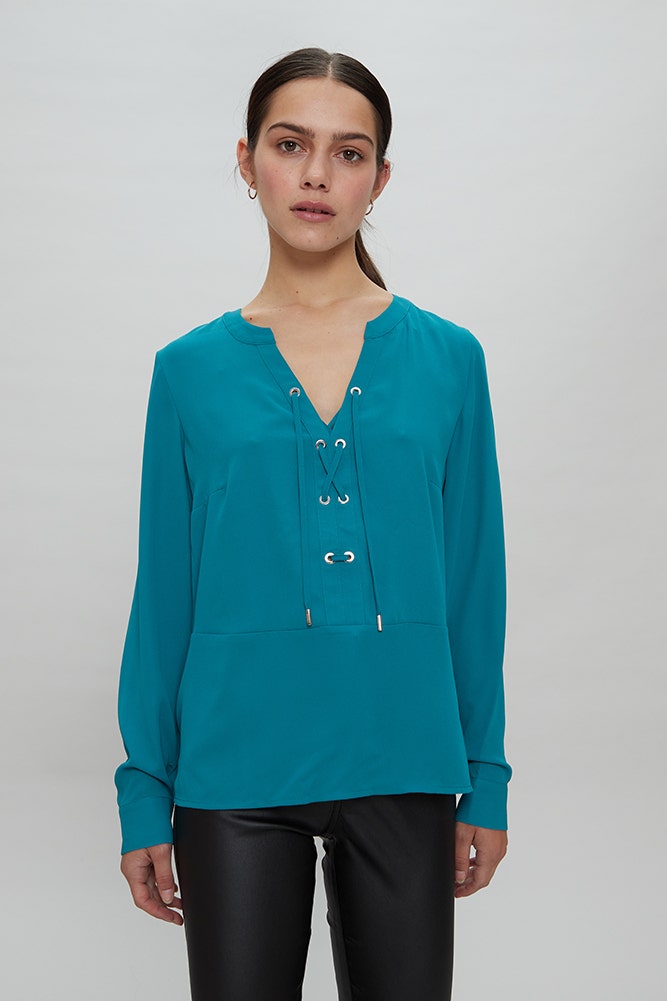 BLUSA CON LAZOS CRUZADOS