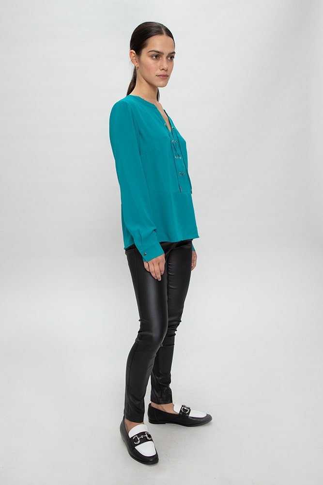BLUSA CON LAZOS CRUZADOS