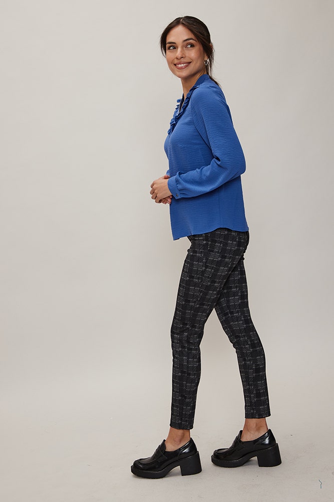 BLUSA CON CIERRE Y VUELOS 