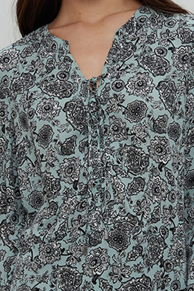 BLUSA ESTAMPADO DE FLORES CON LAZOS CRUZADOS