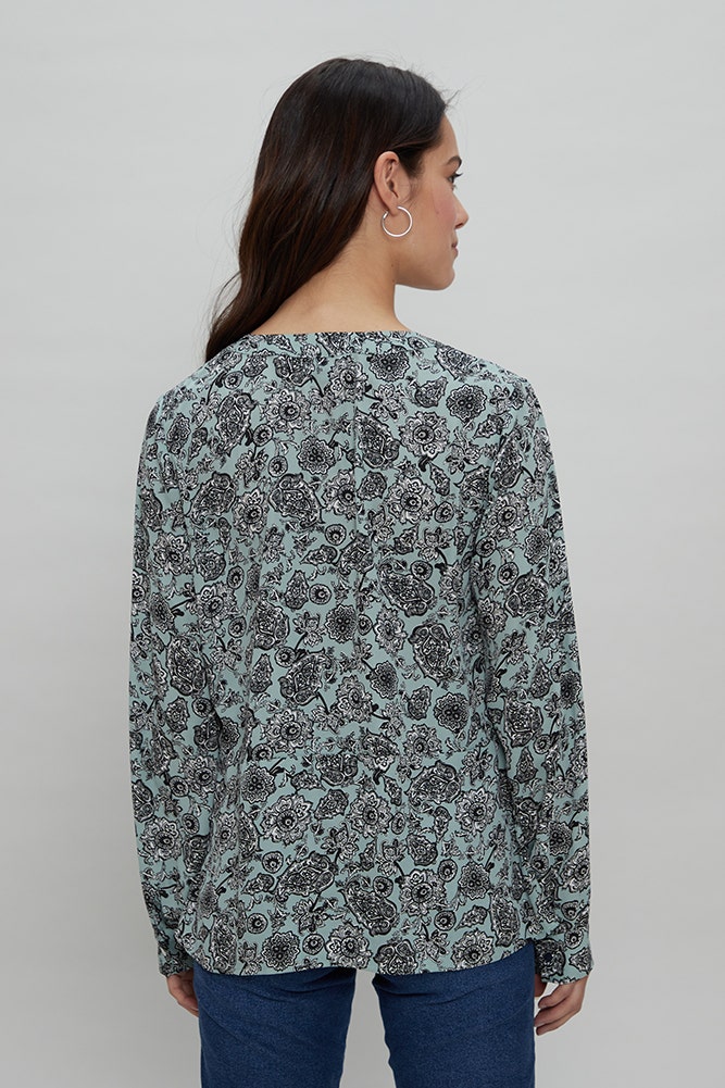 BLUSA ESTAMPADO DE FLORES CON LAZOS CRUZADOS
